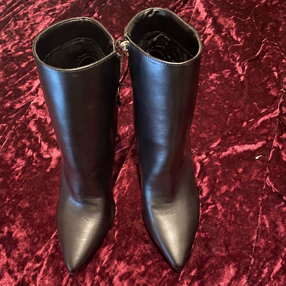Nine W. booties with clear he’ll very nice and classy